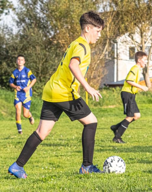 Charlie Holder on the ball in midfield